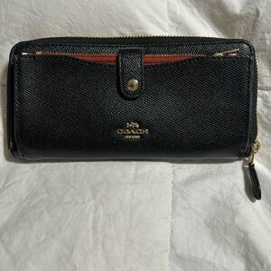 Medium sized Coach wallet with removable smaller wallet for cards.